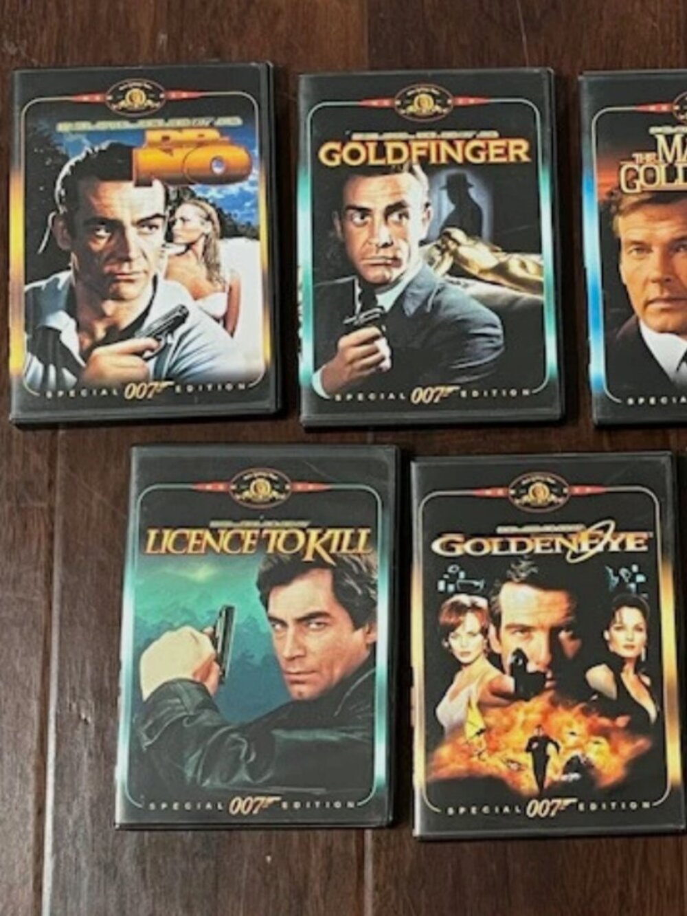 James Bond 007 Lot of 7 DVDs - Dr. No, Goldfinger, Golden Eye, Spy Who Loved Me